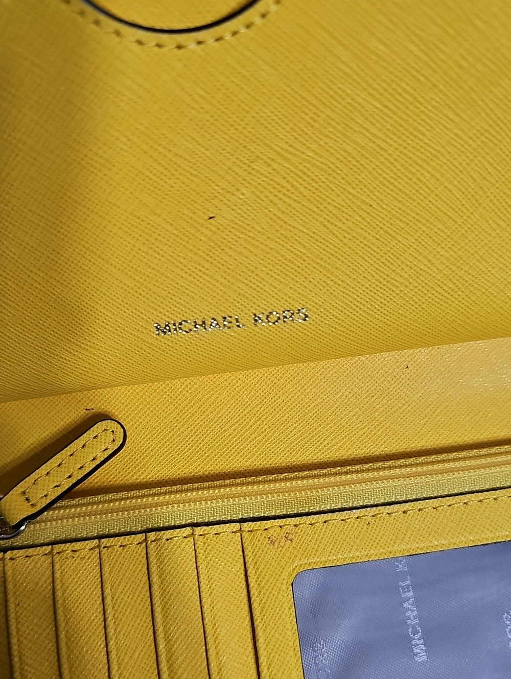 PRICE REDUCED....Michael Kors Zip Around Wallet/ Detachable Strap...Sunflower